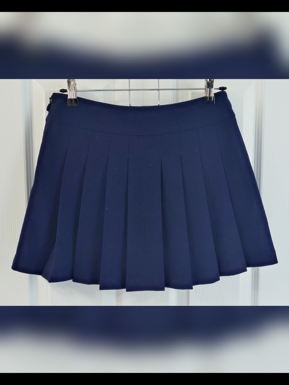 Navy Pleated Mini Skirt with Gold Buckle Accents - Picture 2 of 7